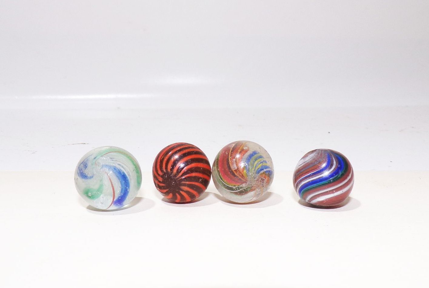 Alte Glasmurmeln 10 Stück wohl Lauscha Glas Murmel marbles Abriss Swirl