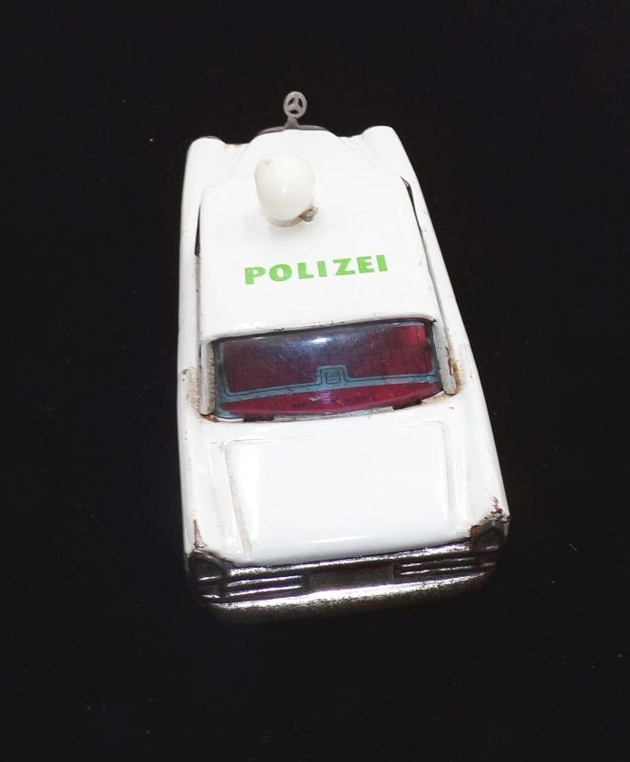 Altes Mercedes Polizei Auto altes Blechspielzeug 