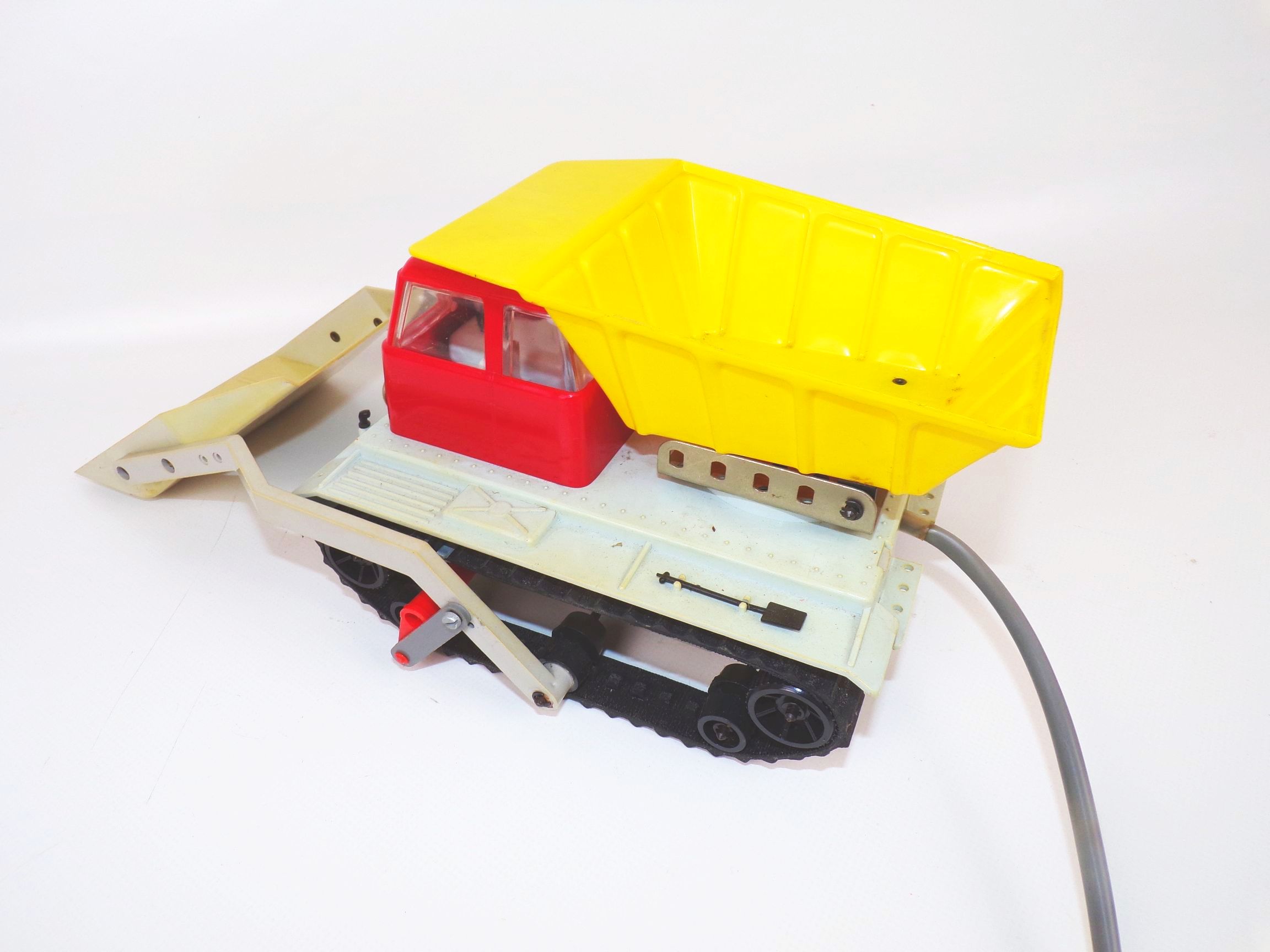 Uniket Raupe Fernlenkauto Selbstlader DDR Spielzeug