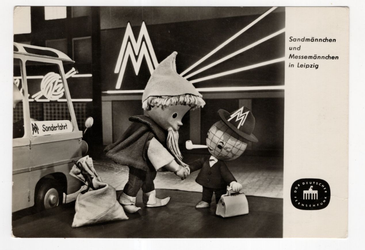 Ak Sandmännchen und Messemännchen in Leipzig DDR 1965