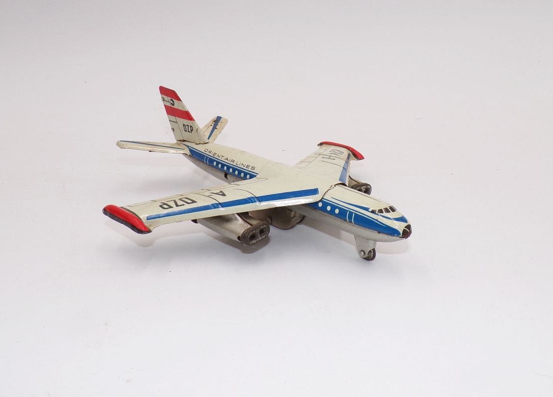 Altes Blechspielzeug Flugzeug Orient Airlines Schwungrad DZP Vintage