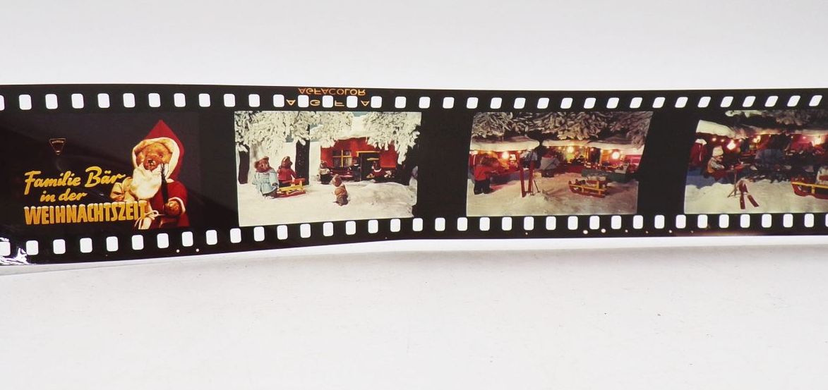 Rollfilm Familie Bär in der Weihnachtszeit Bakelit Dose Mikrolux
