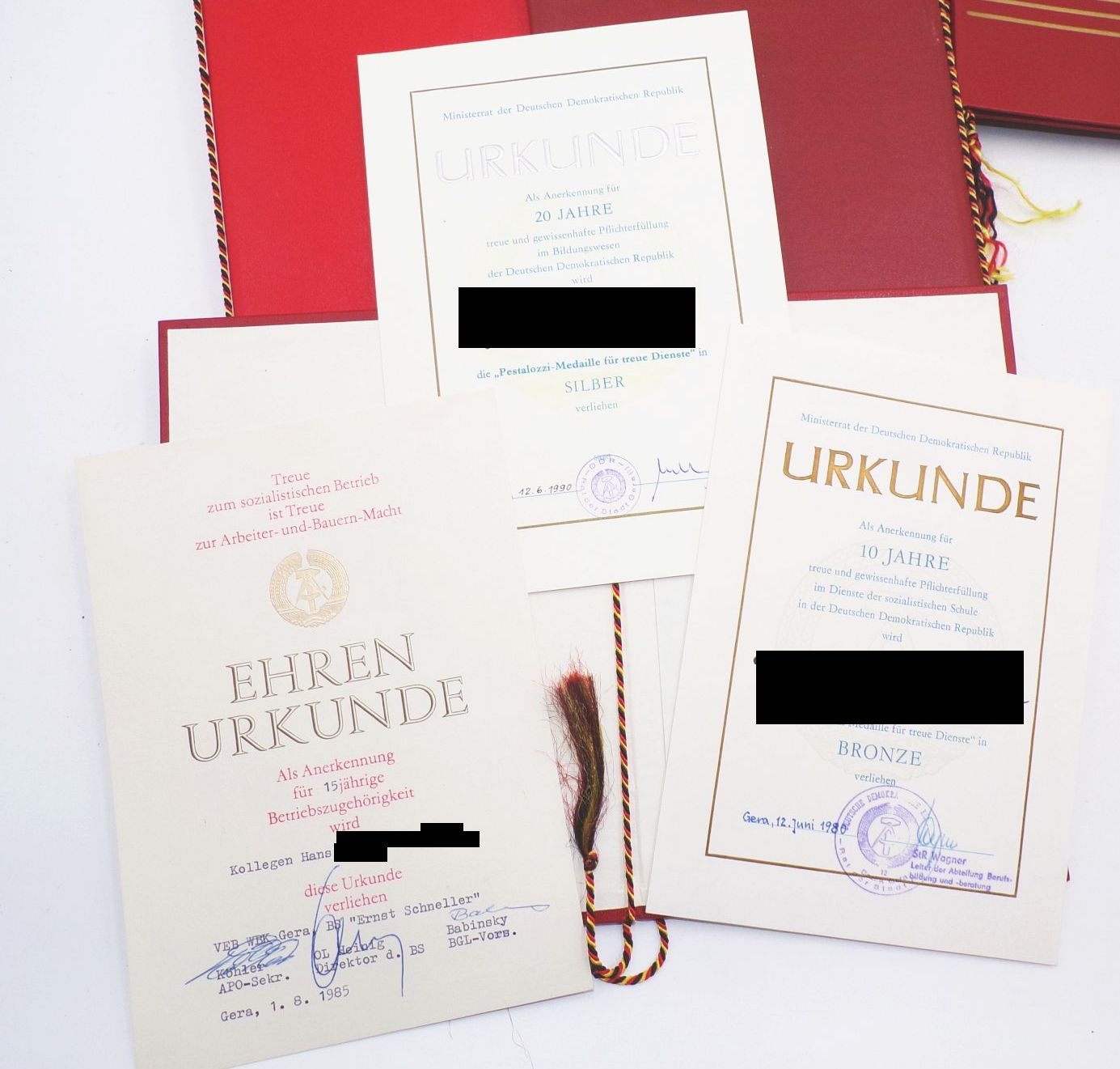 Konvolut DDR Abzeichen Urkunden