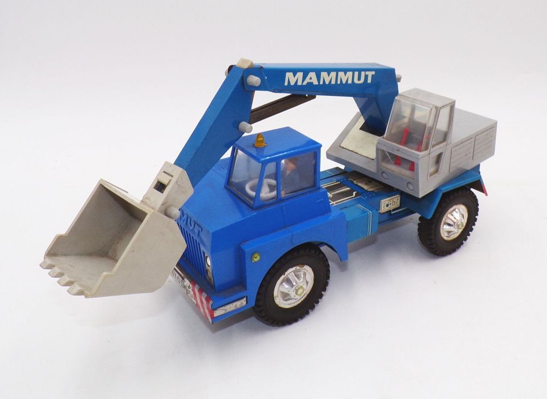 MSB Mammut Bagger LKW DDR Blechspielzeug mit Schwungrad