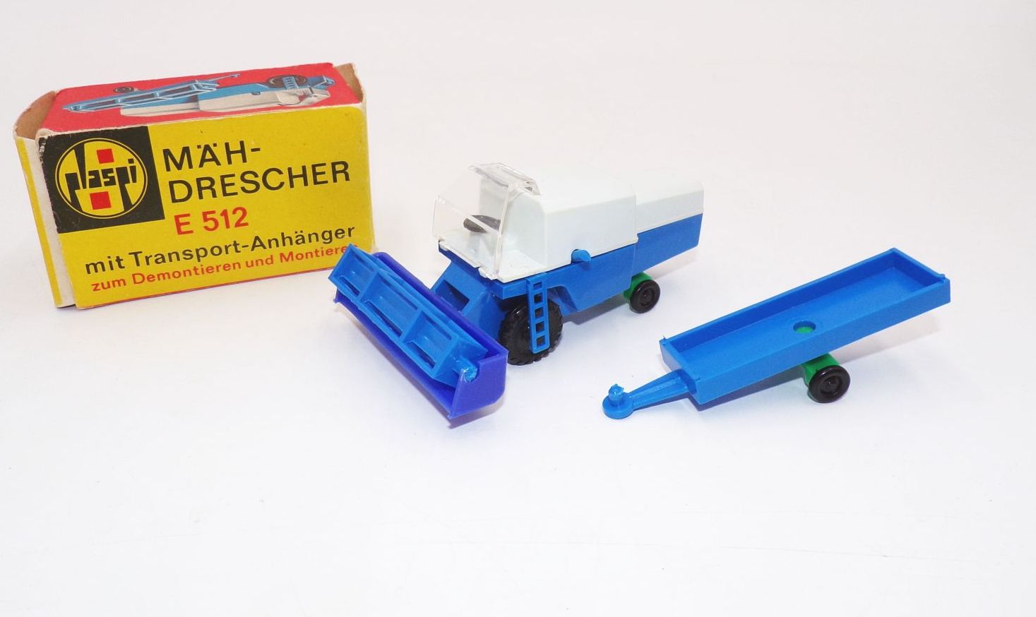 Plaspi Mähdrescher E512 mit Transportanhänger und Originalkarton