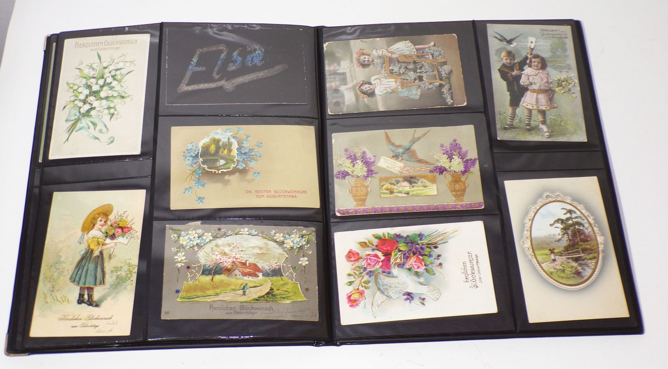 Album mit 99 Glückwunschkarten Ansichtskarten Postkartenalbum