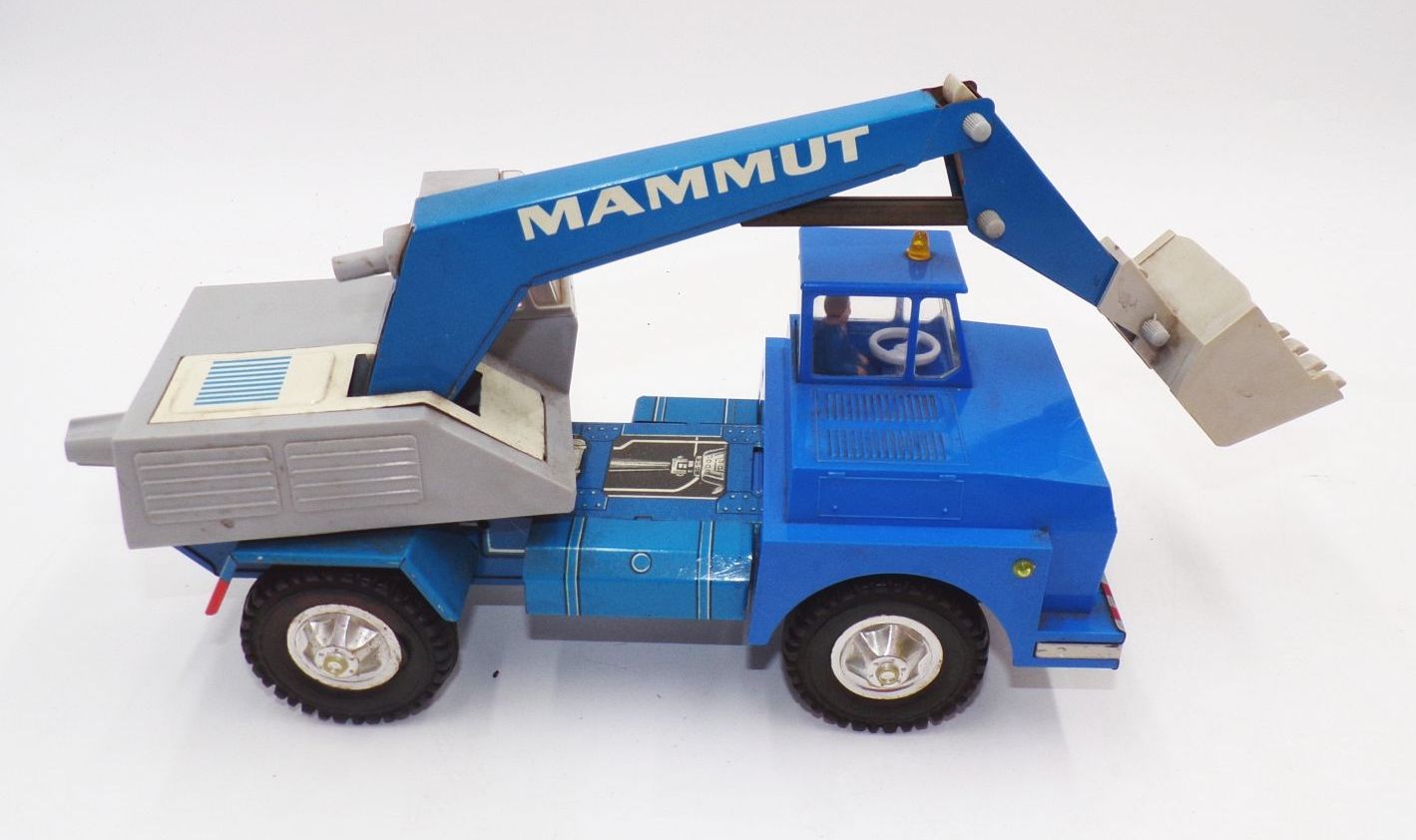 MSB Mammut Bagger LKW DDR Blechspielzeug mit Schwungrad MSB Mammut Bagger LKW DDR Blechspielzeug mit Schwungrad