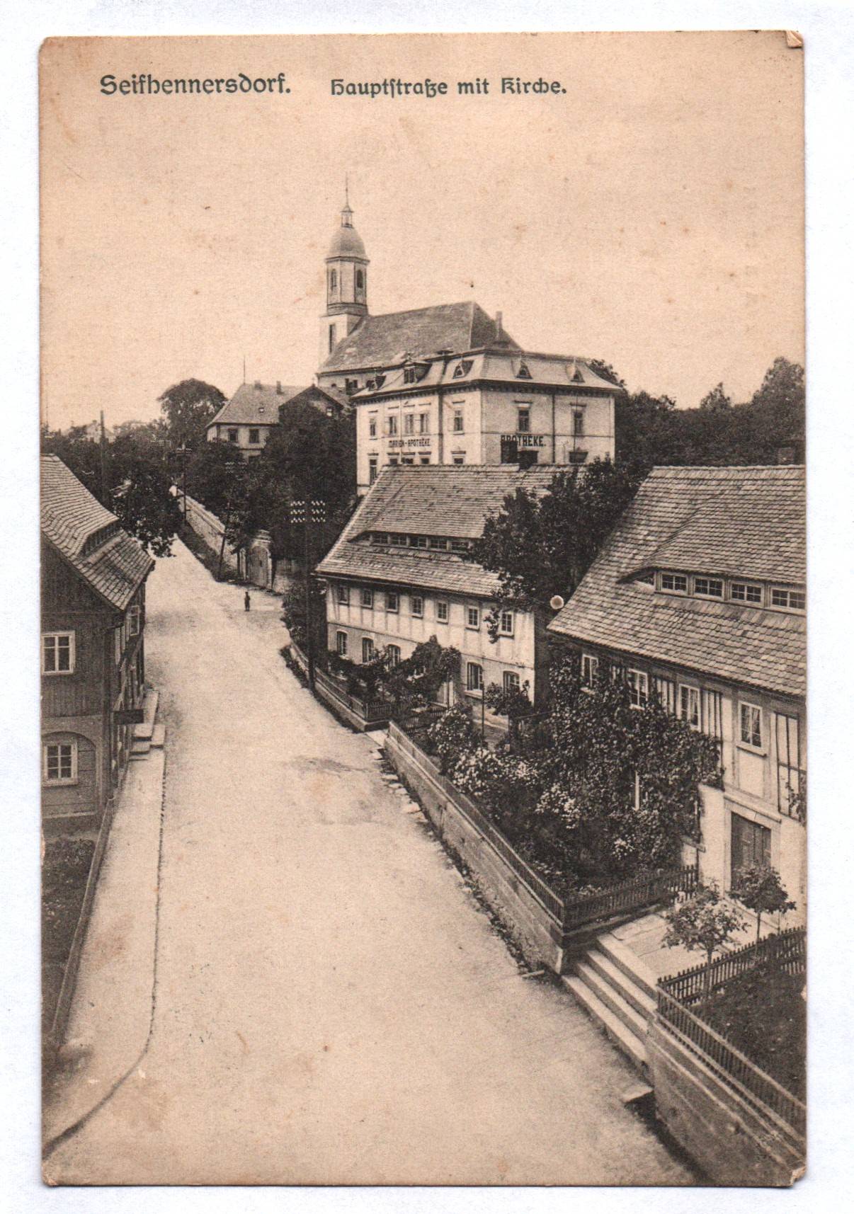Ak Seifhennersdorf Hauptstraße mit Kirche