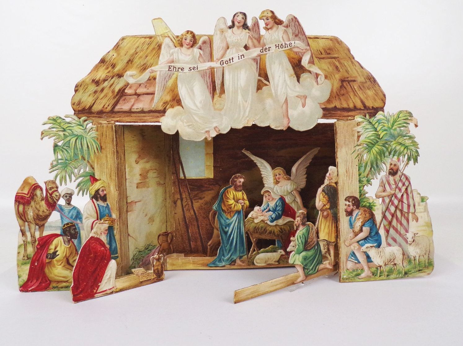 Alte Weihnachtskrippe kleine Aufstellkrippe aus Papier 3 D Weihnachtsschmuck 