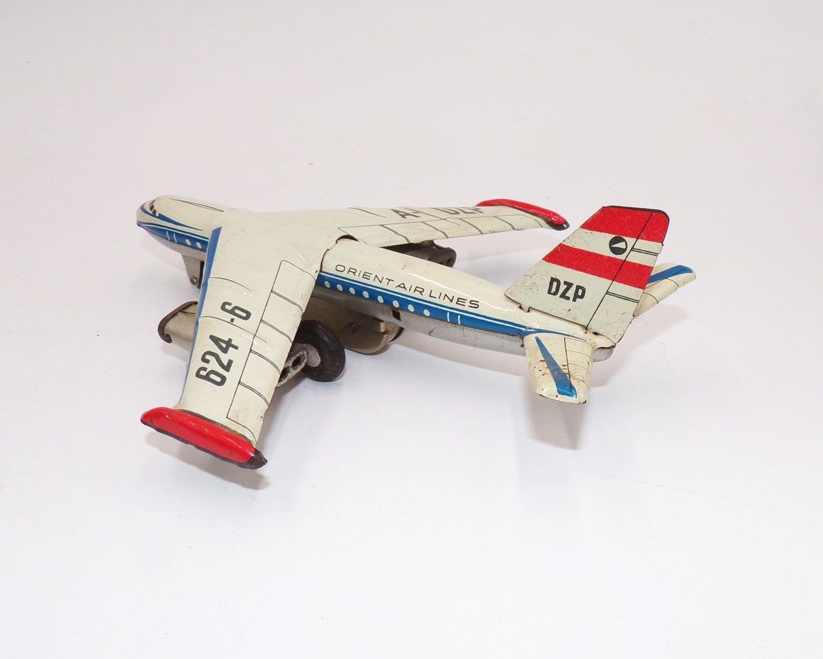 Altes Blechspielzeug Flugzeug Orient Airlines Schwungrad DZP Vintage
